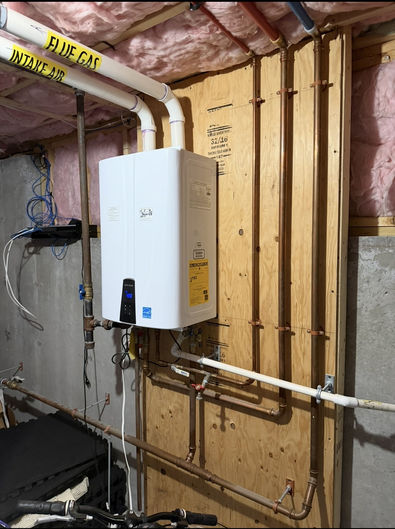 A-1 Navien wall-mounted installation with copper piping and overhead venting