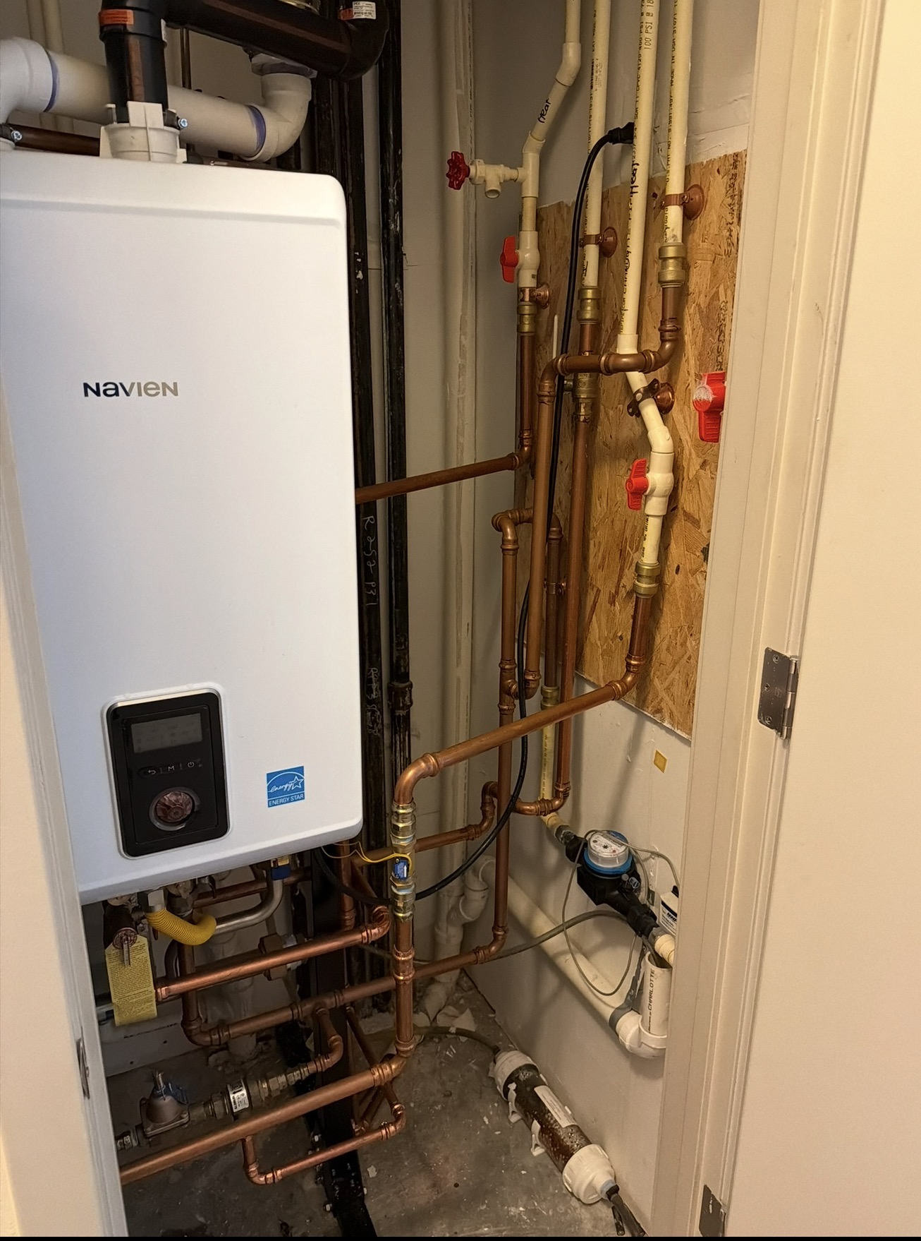 A-1 Navien installation in a utility closet